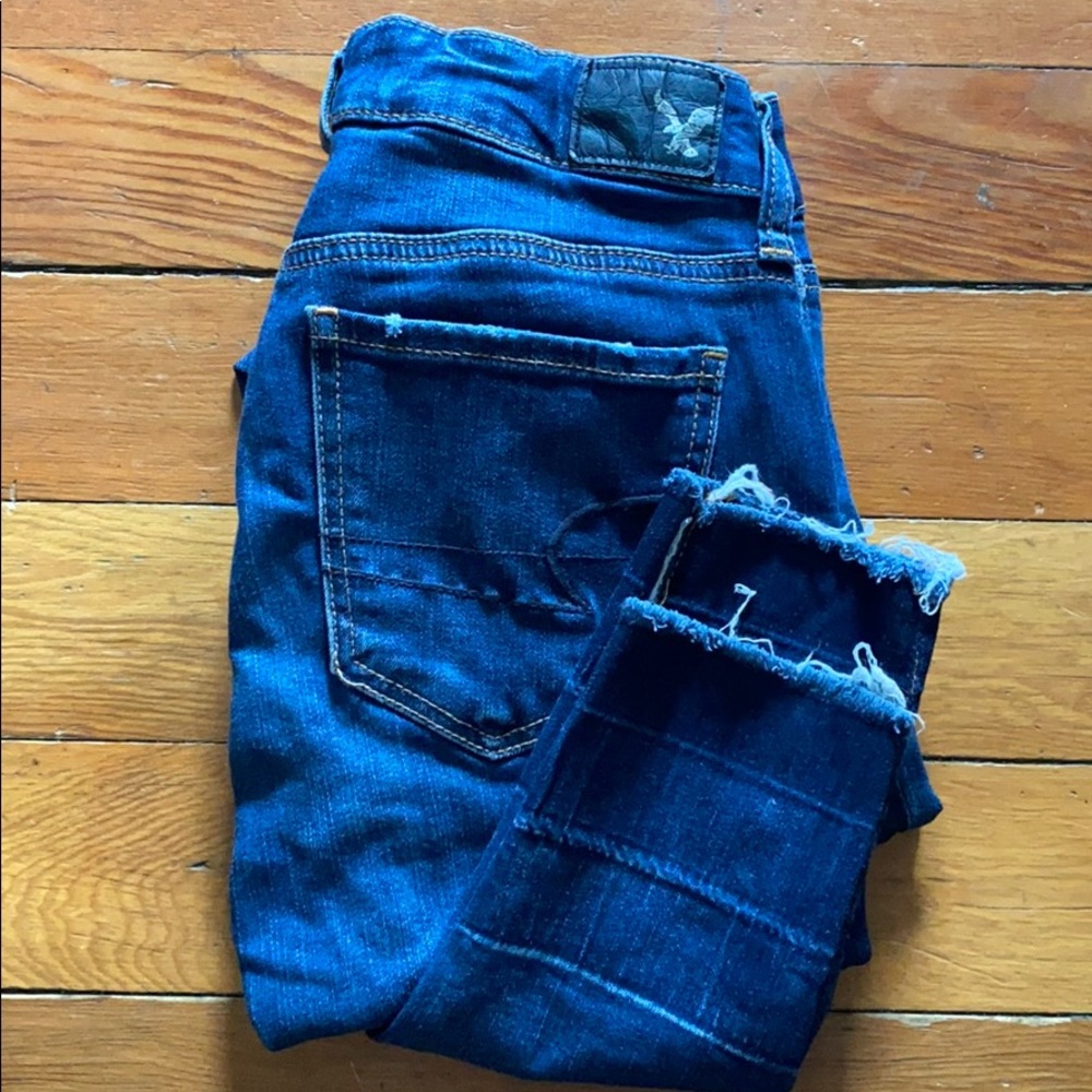American Eagle Distressed Hem Blue Jeans
